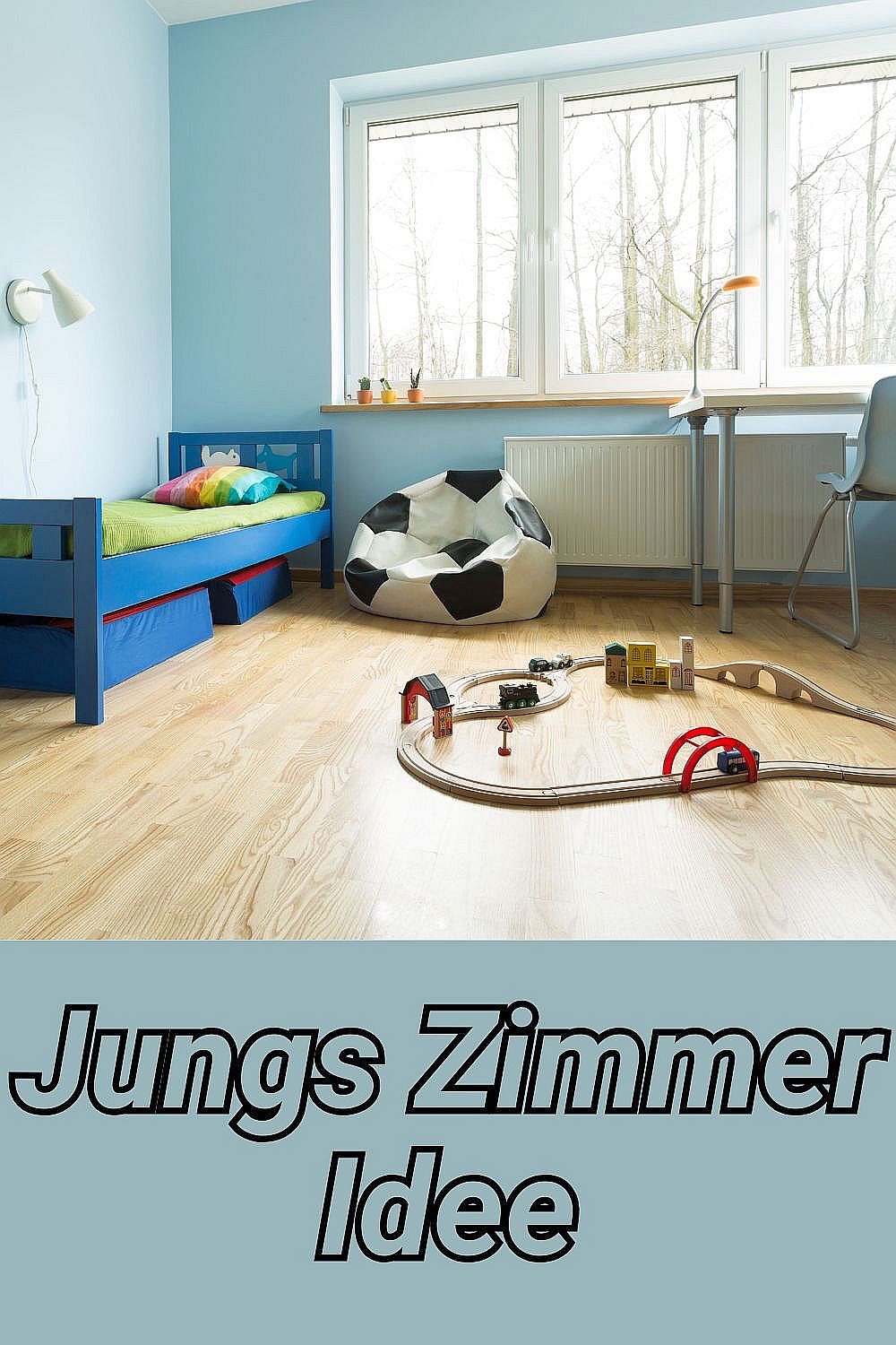 Kinderzimmer Ideen Jungszimmer Jungenzimmer mit blauem Bett und Holzeisenbahn